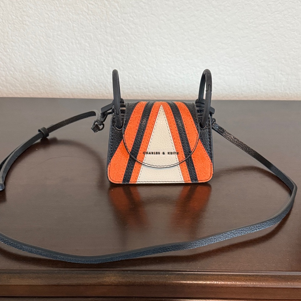 Charles & Keith Mini Vibrant Orange and Black Crossbody Bag